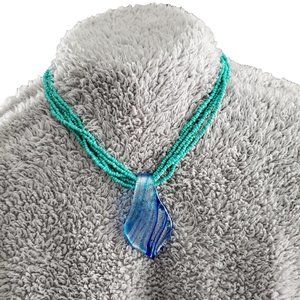 Turquoise Multi Beaded Strands W/Glass Pendant